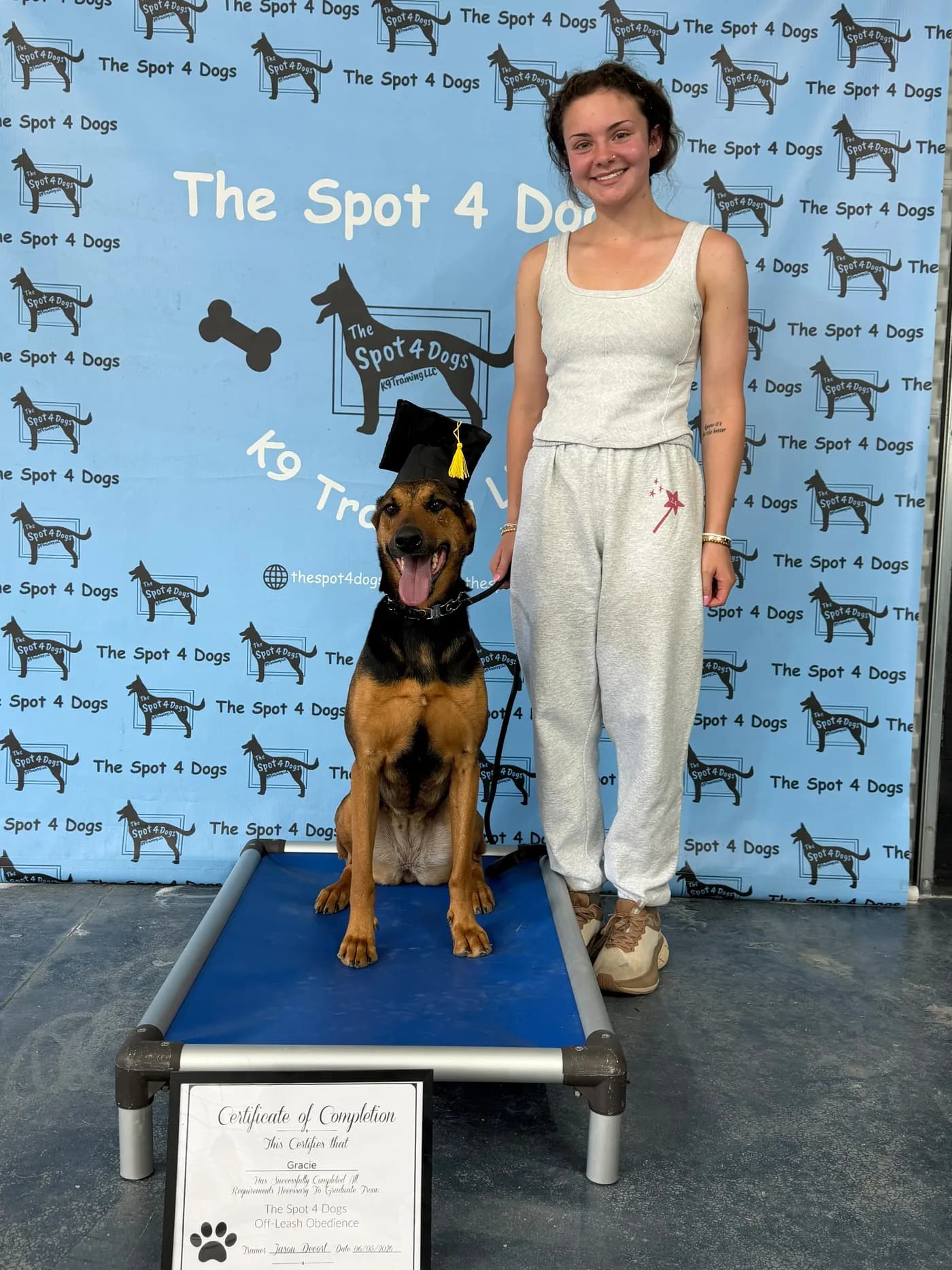 A Spot 4 Dogs graduate and her dog